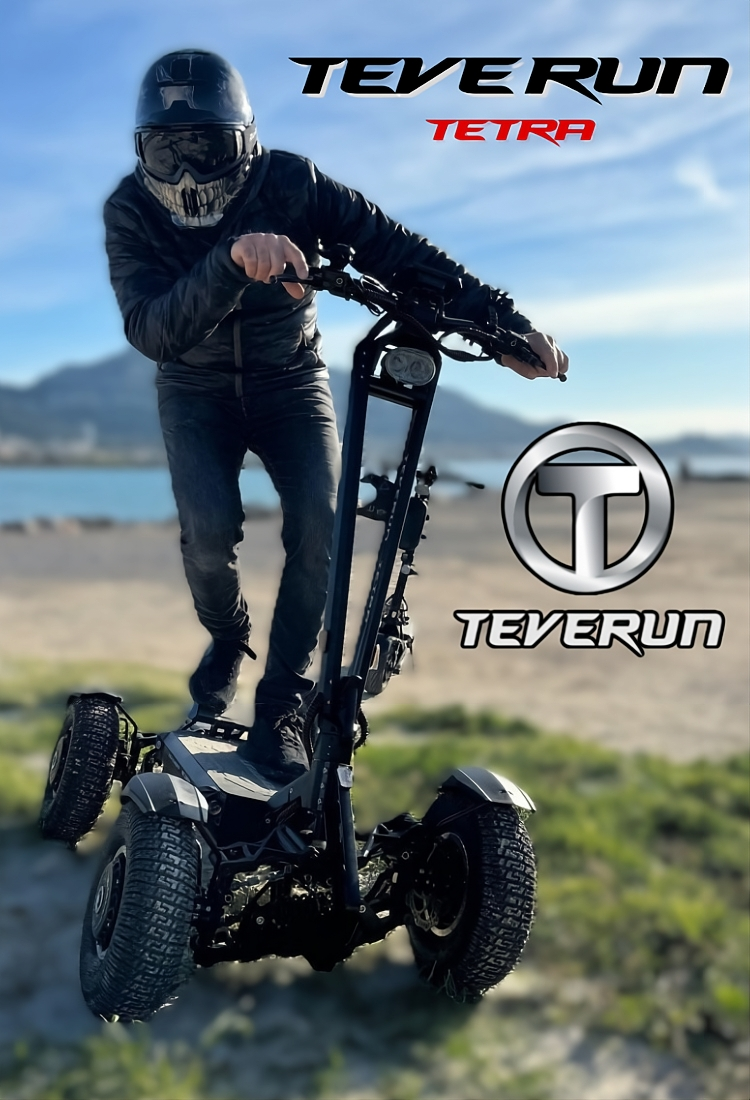 Person riding a TEVERUN Tetra electric scooter outdoors with scenic background